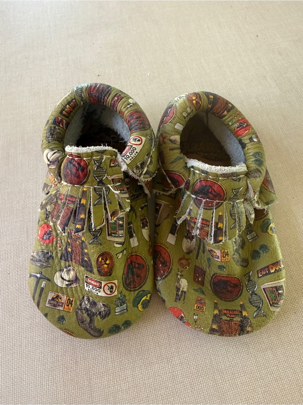 Baby Moccosins Olive Green Jurassic Park print